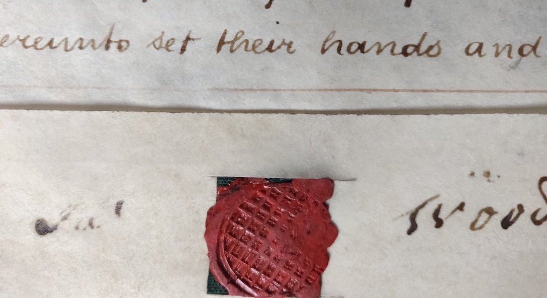 Close-up of old letter with wax seal.