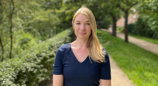 Close-up of Christiana Dietzen standing in a park.